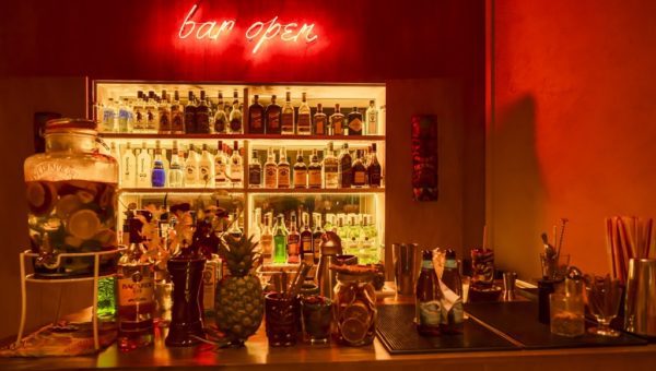 Aloha Poké Turns Into A Hawaiian Tiki Bar at Night Tiki Bar