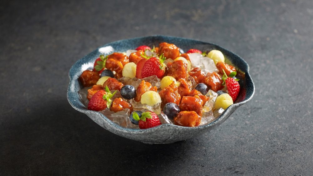 Sweet and Sour Pork Fruit platter on ice